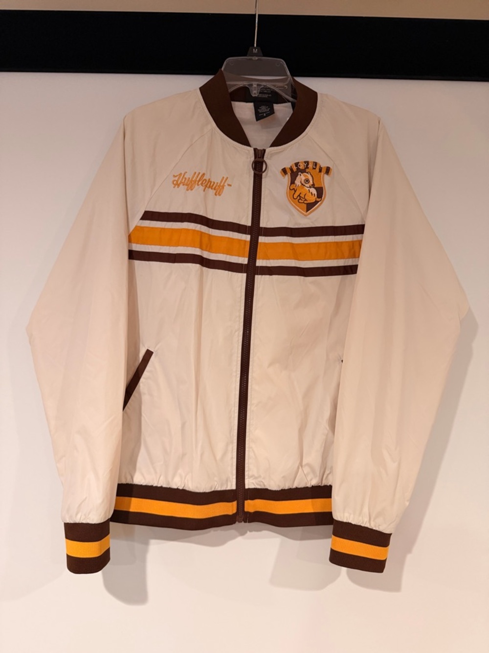 Warner Bros. Harry Potter Hufflepuff Crest Jacket in Cream & Brown